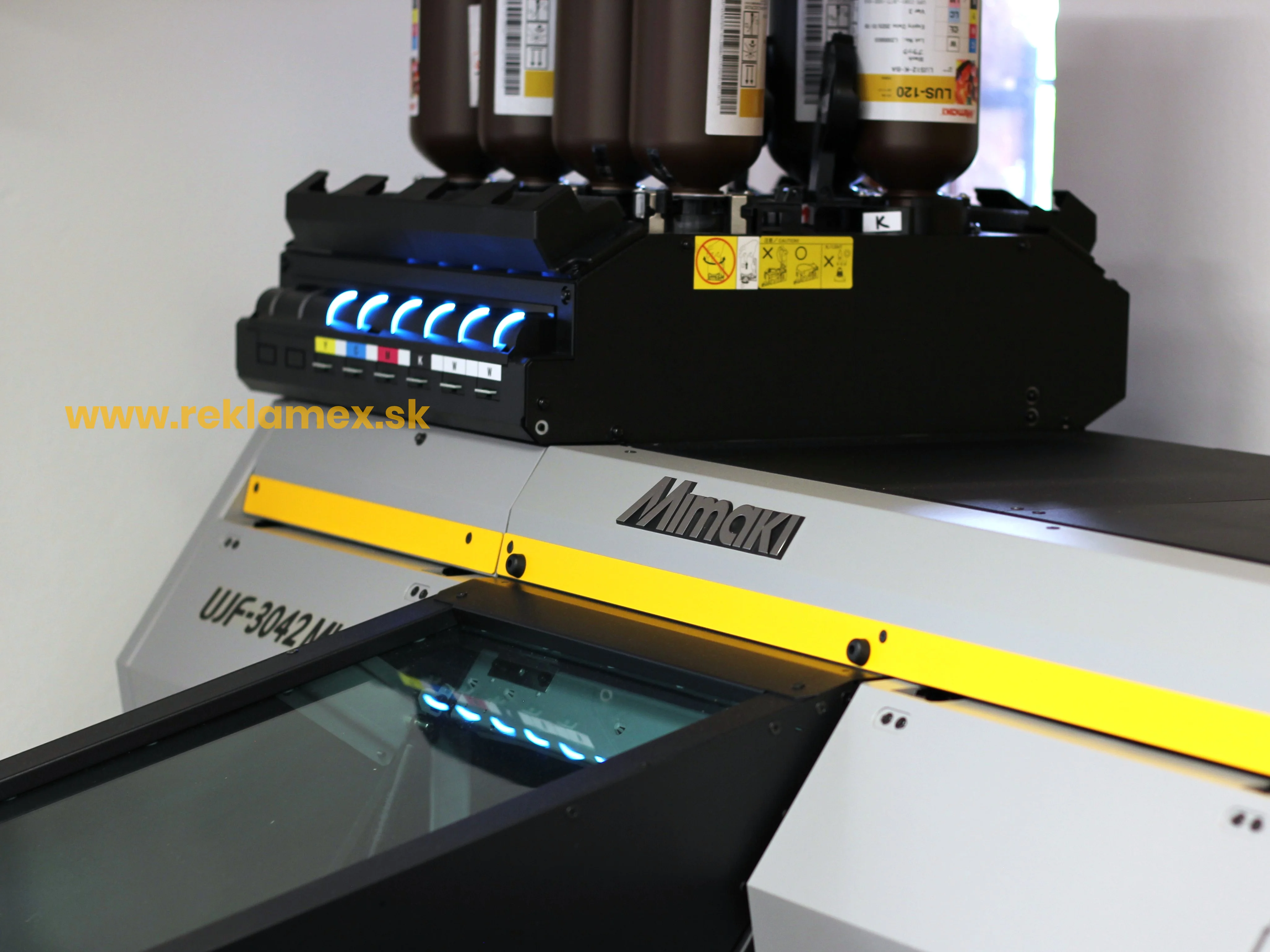 Reklamné predmety s potlačou - fotografia UV potlače reklamných predmetov